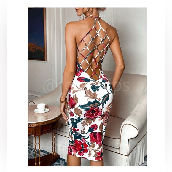 Stretchy soft dress with revealing back and snatched derrière. Head turner!